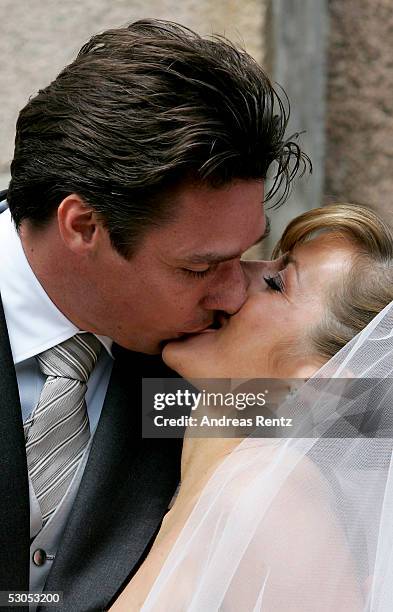 Michael Stich and his wife Alexandra Stich, maiden name Rikowski, kiss at the Sankt Severin church on June 11, 2005 at Sylt, in Germany. Michael...