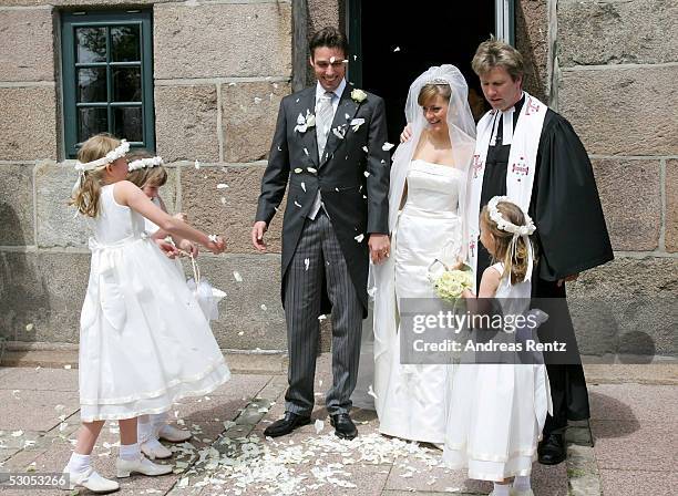 Michael Stich , and his wife Alexandra Stich , maiden name Rikowski and Pastor Rainer Chunnow at the Sankt Severin church on June 11, 2005 at Sylt,...