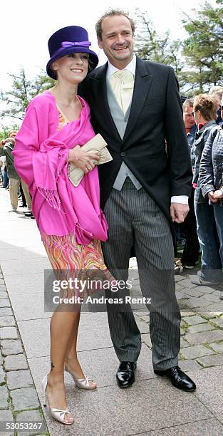 Jenny Elvers-Elbertzhagen , actress and her husband Goetz Elbertzhagen at the Sankt Severin church on June 11, 2005 at Sylt, in Germany. Michael...