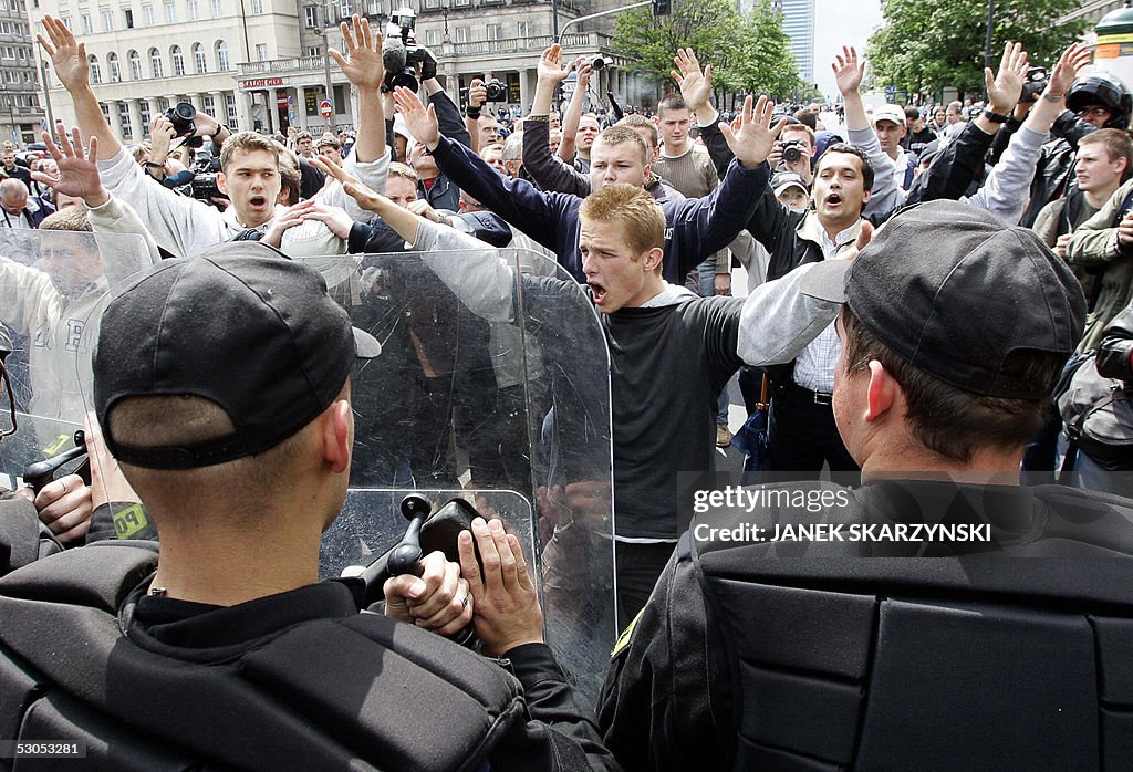 Police face demonstrators who protested