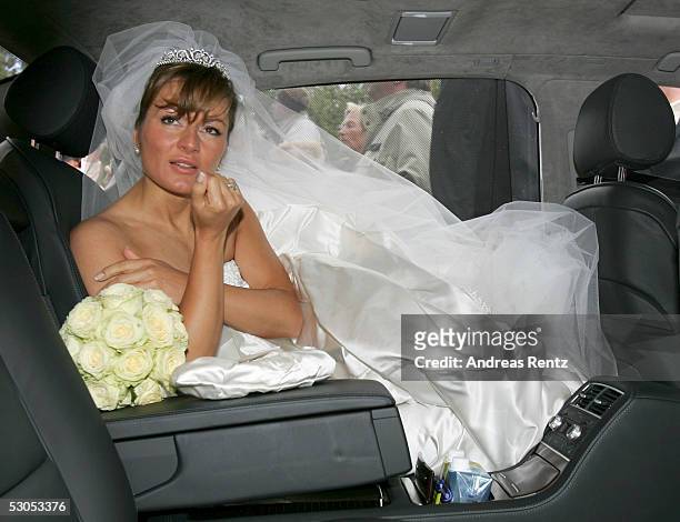 Alexandra Stich, maiden name Rikowski sits in the wedding car at the Sankt Severin church on June 11, 2005 at Sylt, in Germany. Michael Stich and...