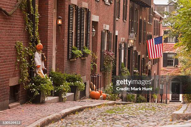 acorn street during halloween - acorn street boston stock-fotos und bilder