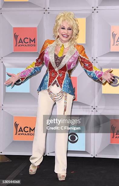 Singer-songwriter and producer Dolly Parton, winner of the Tex Ritter Award for 'Dolly Parton's Coat of Many Colors,' poses in the press room during...