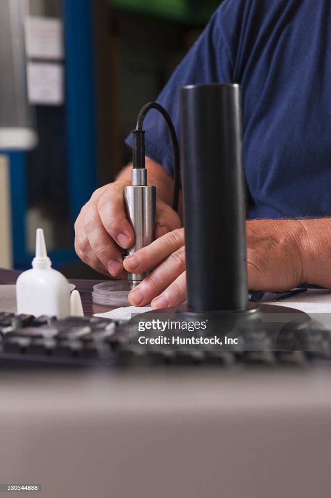O2 Probe Lab Engineer Rebuilding An O2 Electrochemical Sensor Probe In A Laboratory ...