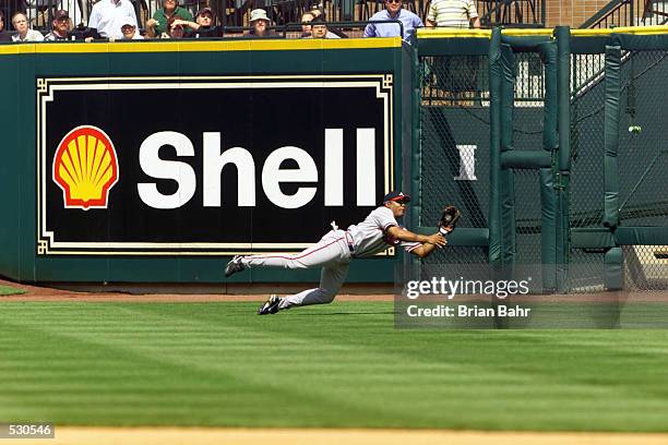 Andruw Jones of the Atlanta Braves makes catch against the Houston Astros during the National League divisional series at Enron Field in Houston,...