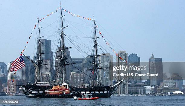 In this handout photo provided by the U.S. Coast Guard, multiple Coast Guard resources escort the USS Constitution, Boston's beloved "Old Iron...