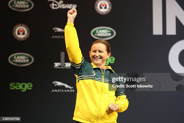 Darleen Brown of Australia receives the Bronze medal for women's lightweight powerlifting finals at the Invictus Games on May 9, 2016 in Lake Buena...