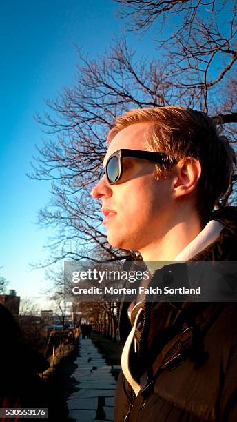 sun in his face - akershus festning stock pictures, royalty-free photos & images