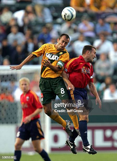 Peter Vagenas of the Los Angeles Galaxy and Jason Kreis of Real Salt Lake go up for a head ball during the first half of an MLS game on June 11, 2005...