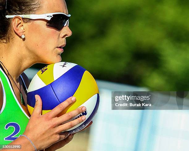 Viktoria Bieneck of Germany waits to serve the Mikasa during the 2nd day of the FIVB Antalya Open beach volley tournament, May 11 in the...