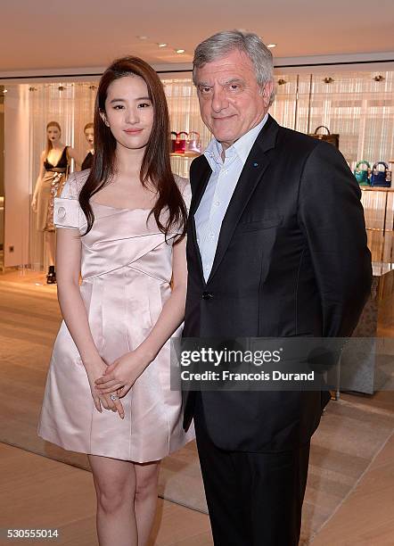 Liu Yifei and CEO Sidney Toledano attend the Dior Boutique Opening during the 69th Annual Cannes Film Festival on May 11, 2016 in Cannes, France.