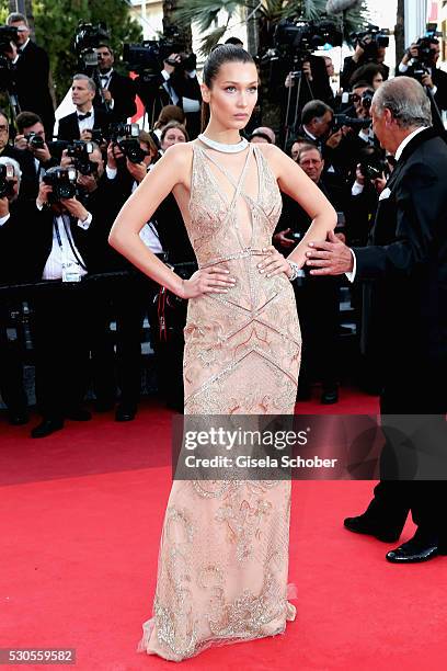 Model Bella Hadid attends the "Cafe Society" premiere and the Opening Night Gala during the 69th annual Cannes Film Festival at the Palais des...