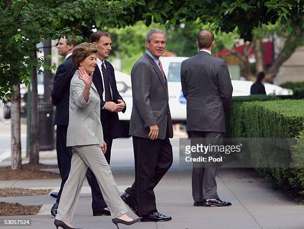President George W. Bush and first lady Laura Bush attend Sunday services at St. John's Church June 12, 2005 in Washington, DC.