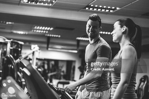 warming up on a treadmill - flirting gym stock pictures, royalty-free photos & images