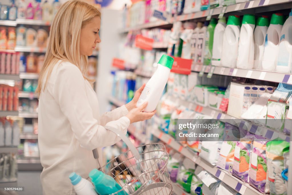 Woman choosing fabric softener