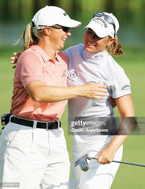 Annika Sorenstam of Sweden hugs her sister Charlotta Sorenstam after winning the McDonald's LPGA Championship on June 12, 2005 at Bulle Rock Golf...
