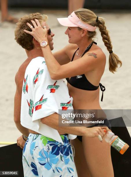 Kerri Walsh congratulates Casey Jennings, after the men's final match at the AVP San Diego Open on June 12, 2005 at Mariner's Point in San Diego,...