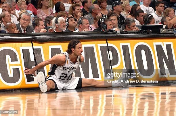 Manu Ginobili of the San Antonio Spurs gets ready to go back in against the Detroit Pistons in Game two of the 2005 NBA Finals on June 12, 2005 at...