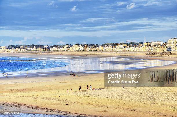 wet sands - st malo stock pictures, royalty-free photos & images