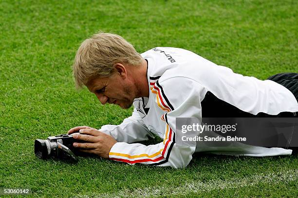 Film Director former professional football player Soenke Wortmann films the German National Team training for the FIFA Confederations Cup on June 13,...