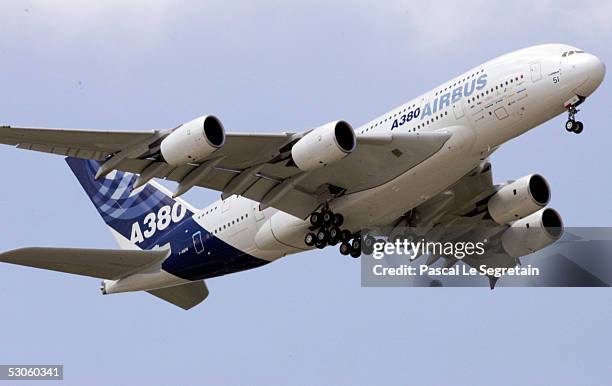 The worlds largest passenger liner, the Airbus A-380 flies on display at the Paris Air-show June 13, 2005 in the Paris suburb of Le Bourget, France....