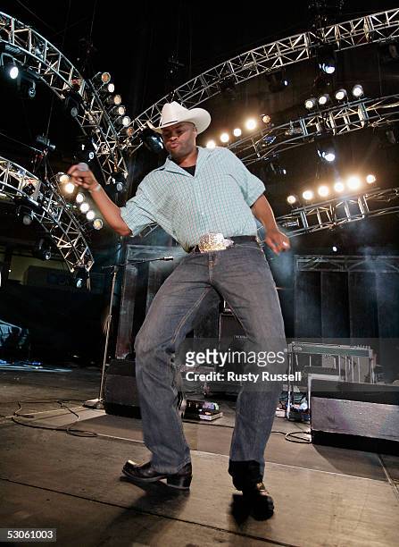 Cowboy Troy, a member of the band Big & Rich's "Musik Mafia," performs at the CMA Music Festival , June 12, 2005 in Nashville, Tenessee.