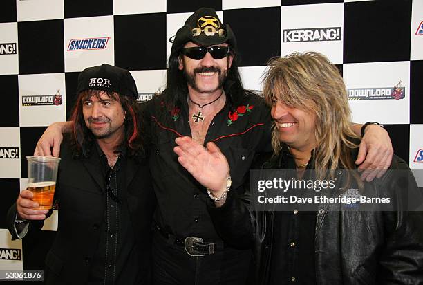 Phil Campbell, Lemmy Kilminster, and Mikkey Dee of Motorhead pose for a photocall on day three of the Download Festival on June 12, 2005 in Donington...