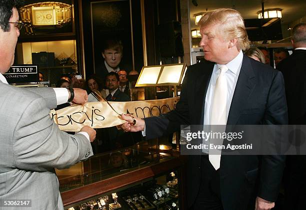 Real Estate mogul and TV personality Donald Trump introduces his new Signature Watch Collection at Macy's Herald Square June 13, 2005 in New York...