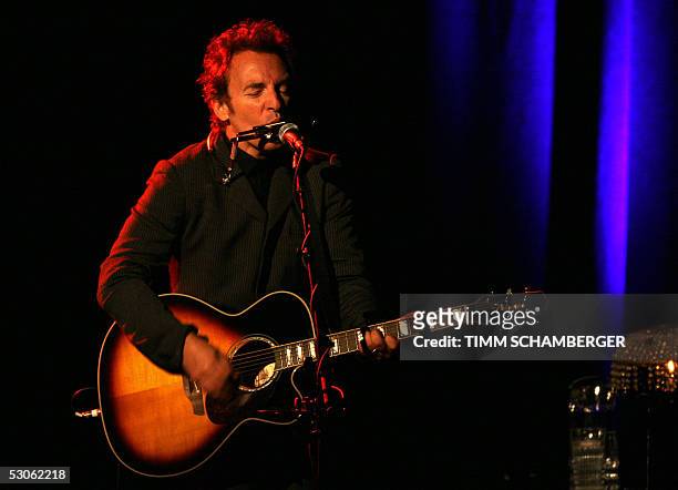 Singer Bruce Springsteen performs on stage during the first concert of his Germany tour 13 June 2005 at Munich's Olympiahalle. He presented songs of...