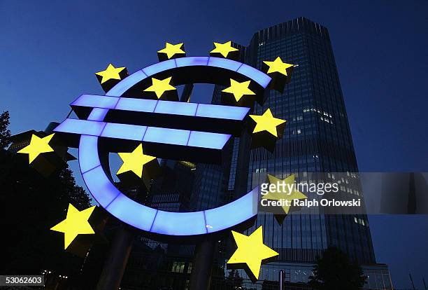 Huge euro logo is seen in front of the headquarters of the European Central Bank on June 13, 2005 in Frankfurt, Germany. The German economy was...