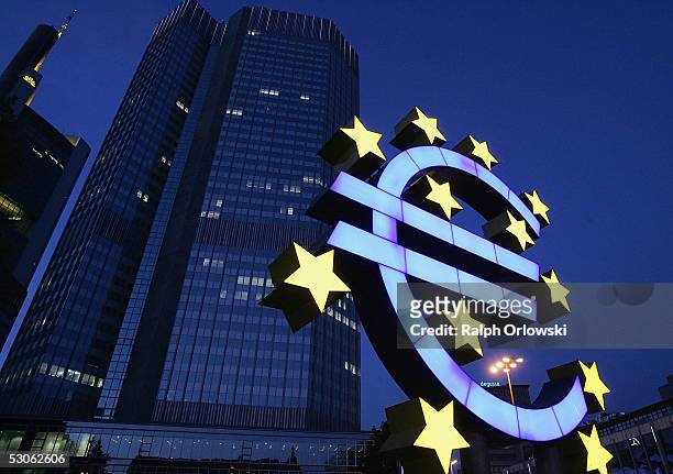 Huge euro logo is seen in front of the headquarters of the European Central Bank on June 13, 2005 in Frankfurt, Germany. The German economy was...