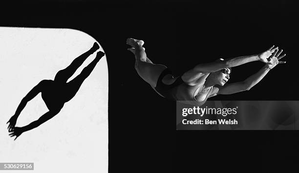 a woman diving into the unknown; tarifa, cadiz, andalusia, spain - tarifa stock pictures, royalty-free photos & images