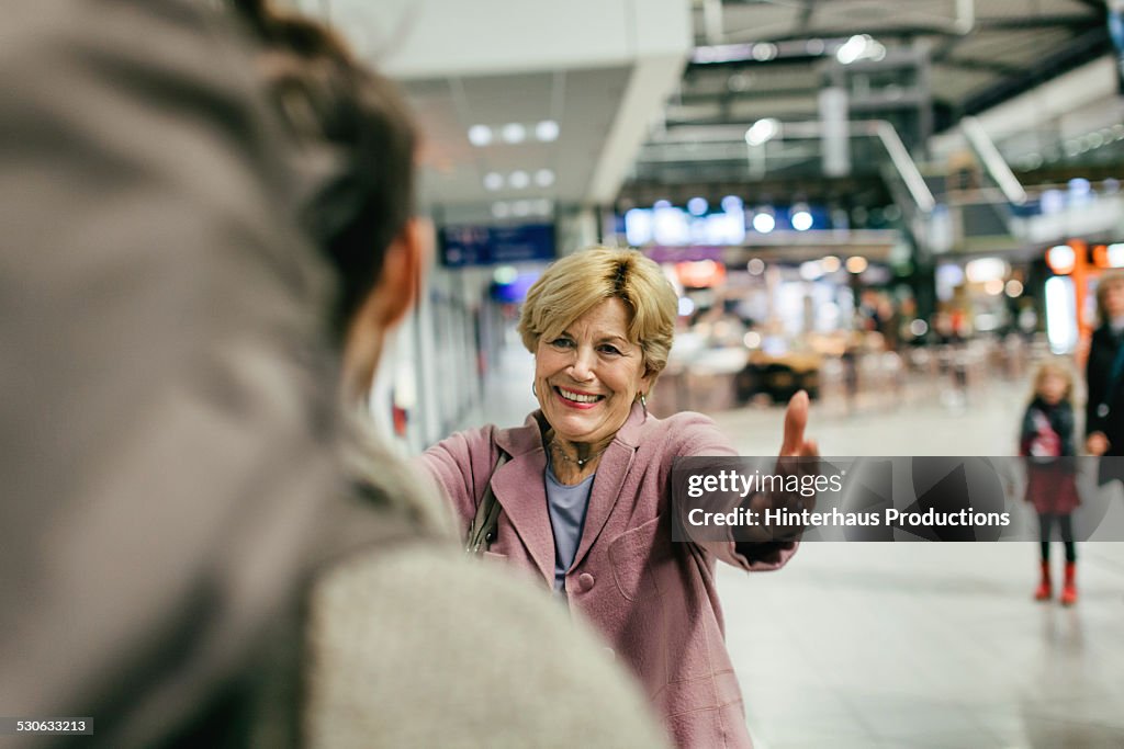 Grandma Welcoming Young Traveller