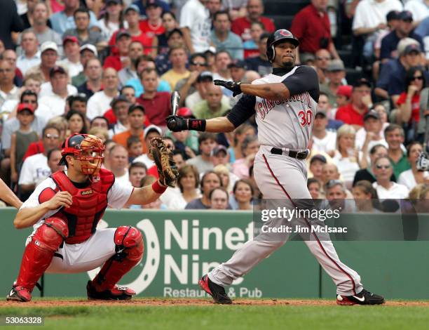 Ken Griffey Jr. #30 of the Cincinnati Reds strikes out against Matt Clement of the Boston Red Sox during their game at Fenway Park on June 13, 2005...