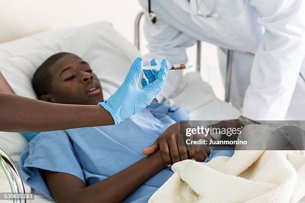 vaccine - ebola hospital stock pictures, royalty-free photos & images