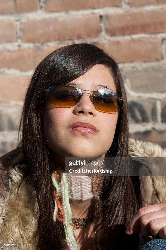 Dark Haired Teen in Aviator Sunglasses