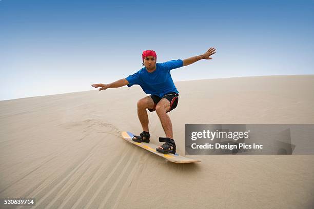 sandboarding in peru - sand boarding stock pictures, royalty-free photos & images