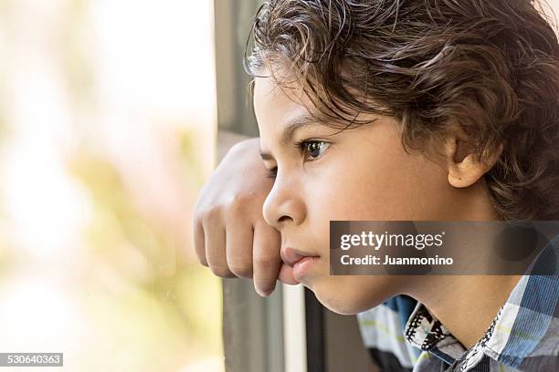 hispanic little boy - orphan boy stock pictures, royalty-free photos & images