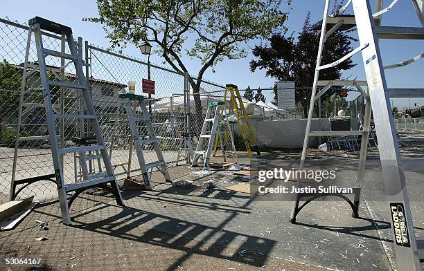 Ladders and makeshift signs lie on the ground as fans and media leave the area after hearing the verdict of not guilty on all charges in the Michael...