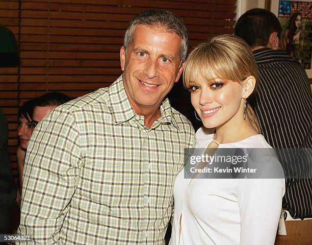 Producer Marc Platt and actress Hilary Duff pose at the afterparty for the premiere of Universal Picture's "The Perfect Man" at the Hard Rock Cafe on...