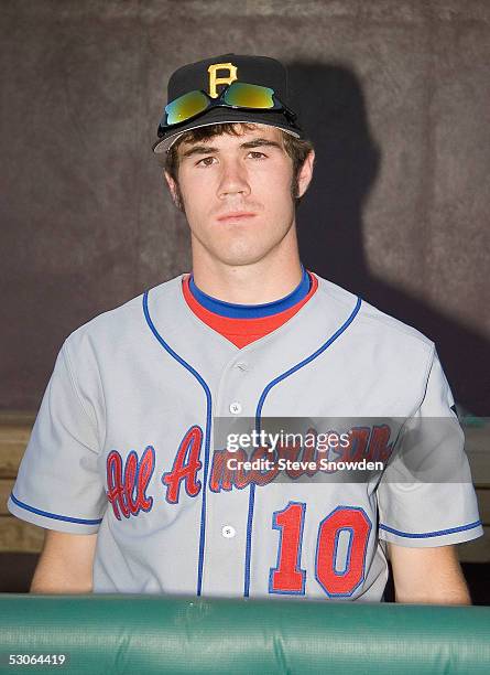 Outfielder Michael Klindt poses in the East team dugout prior to the start of the All-American Baseball Game at Isotope Park on June 13, 2005 in...