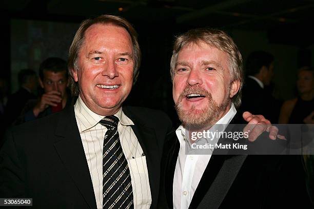 Glen Wheatley and Billy Thorpe pose for a photo at the "Big Night Out Cocktail Party" to promote the upcoming Sydney Swans v Collingwood AFL match at...