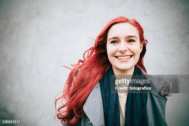 portrait of a laughing redhead teenager girl - dyed red hair stock pictures, royalty-free photos & images