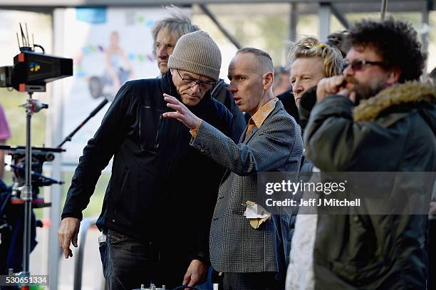 Director Danny Boyle and actor Ewan Bremner, on the set of the Trainspotting film sequel in Muirhouse shopping centre on May 11, 2016 in Edinburgh,...