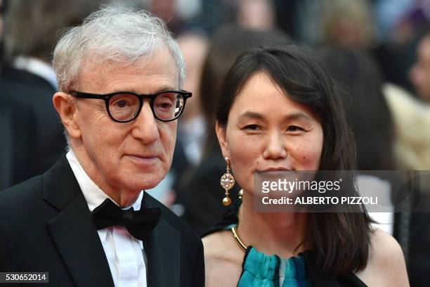 Director Woody Allen and his wife Soon-Yi Previn pose as they arrive on May 11, 2016 for the screening of the film "Cafe Society" during the opening...