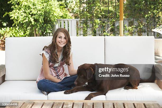 Willa Holland with her dog Manohlo.