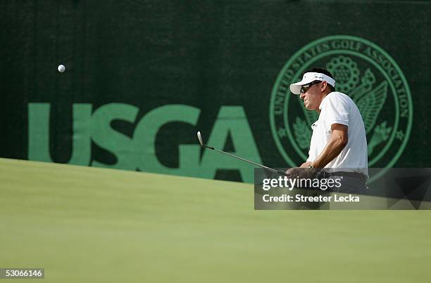 Robert Allenby of Australia hits a chip shot during practice prior to the start of the U.S. Open at Pinehurst Resort June 14, 2005 in Pinehurst,...