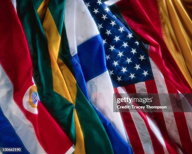 flags of many nations - international flags stock-fotos und bilder