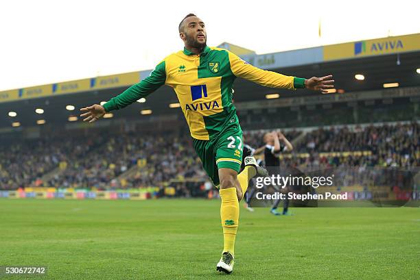 Nathan Redmond of Norwich City celebrates scoring his team's opening goal during the Barclays Premier League match between Norwich City and Watford...