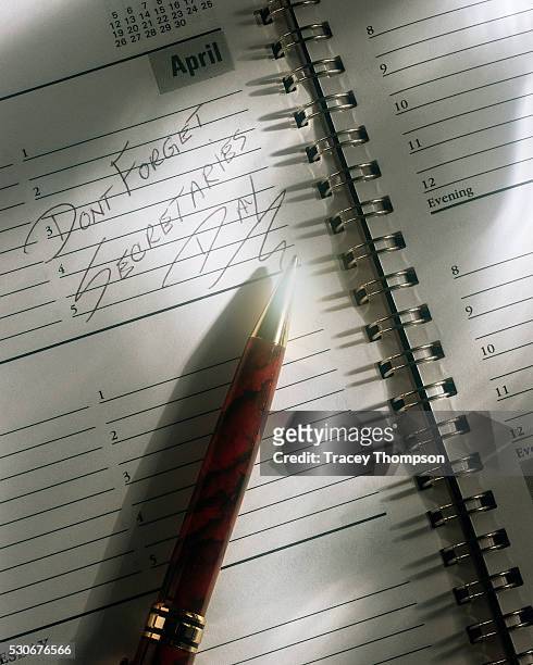 note in daily planner - administrative professional day stock pictures, royalty-free photos & images